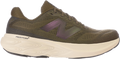 Green running shoe with New Balance logo on a white background