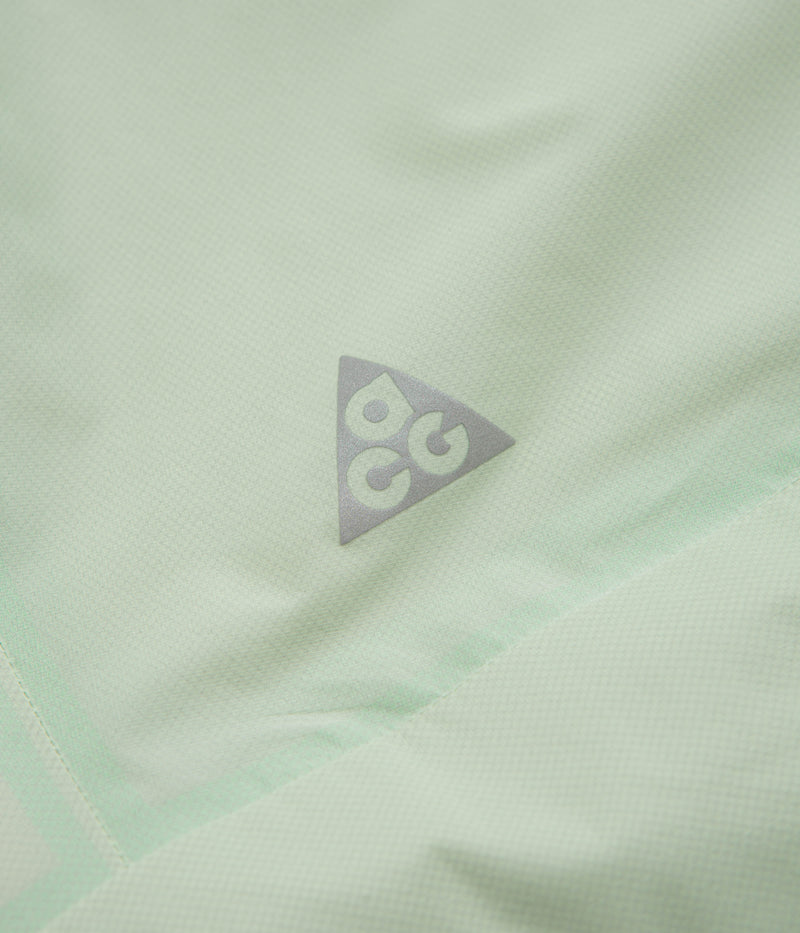Nike ACG Trail Snacks Jacket in Vapor Green and Reflective Silver