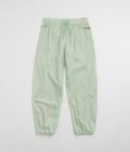Nike ACG Trail Snacks Pants in Vapor Green and Reflective Silver