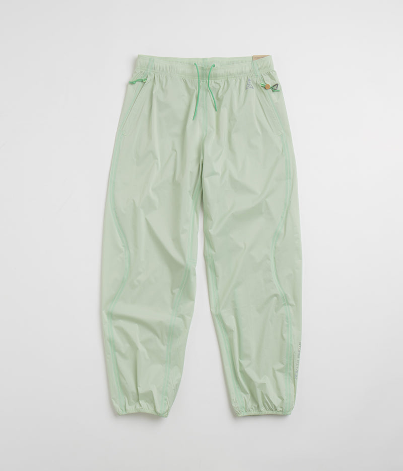 Nike ACG Trail Snacks Pants in Vapor Green and Reflective Silver