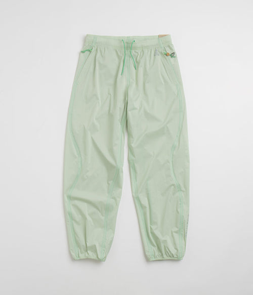Nike ACG Trail Snacks Pants in Vapor Green and Reflective Silver