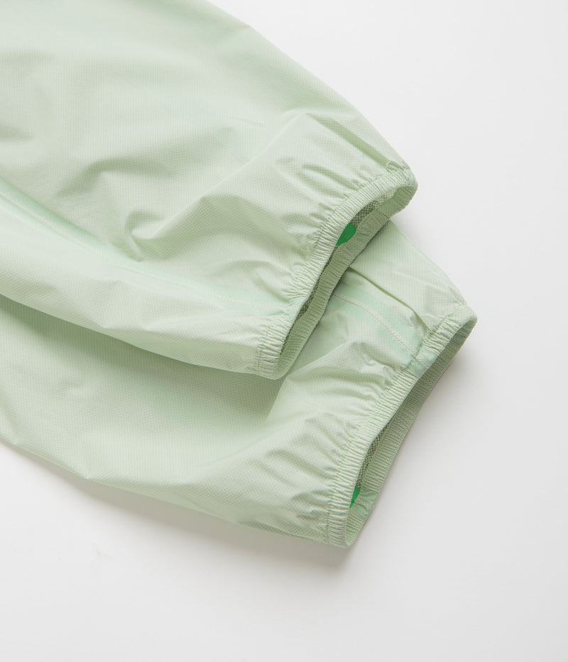 Nike ACG Trail Snacks Pants in Vapor Green and Reflective Silver