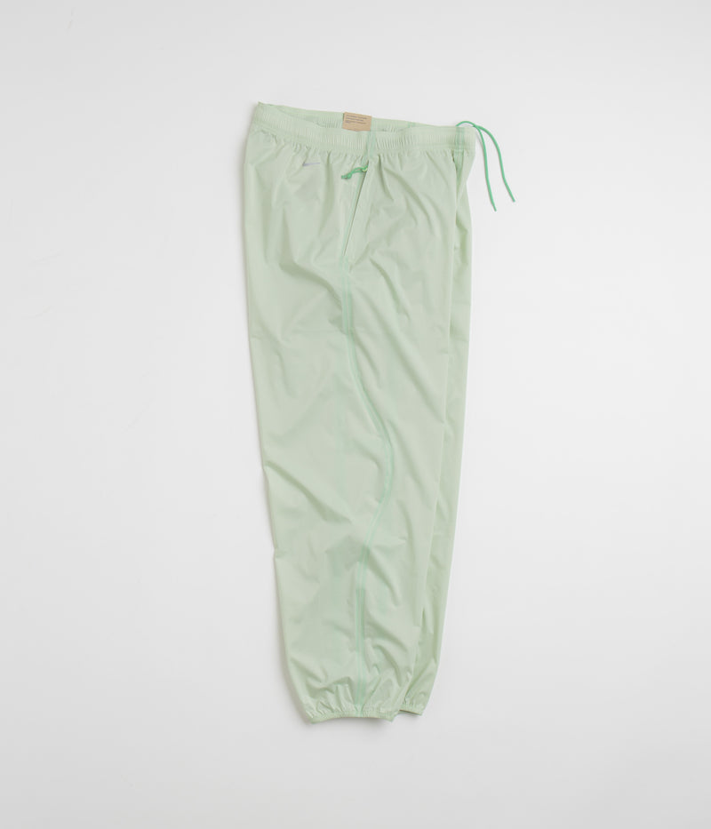 Nike ACG Trail Snacks Pants in Vapor Green and Reflective Silver