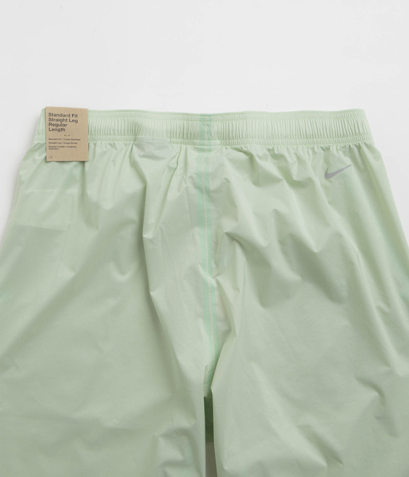 Nike ACG Trail Snacks Pants in Vapor Green and Reflective Silver