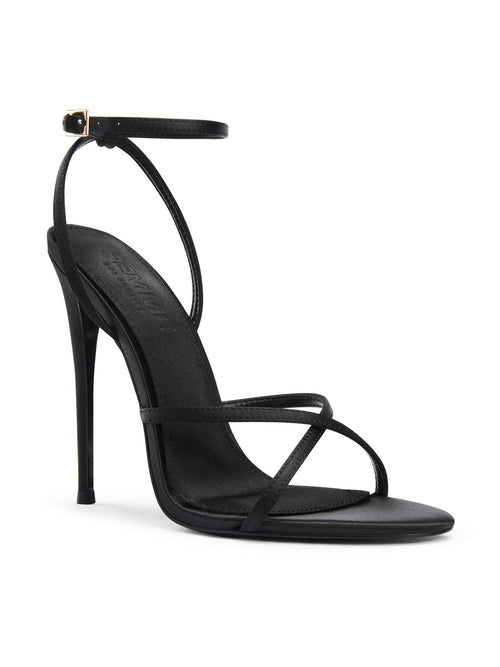 Femme LA Ale Sandal in Satin Black – front three-quarter view showing crossed diagonal toe straps and thin ankle strap with gold buckle