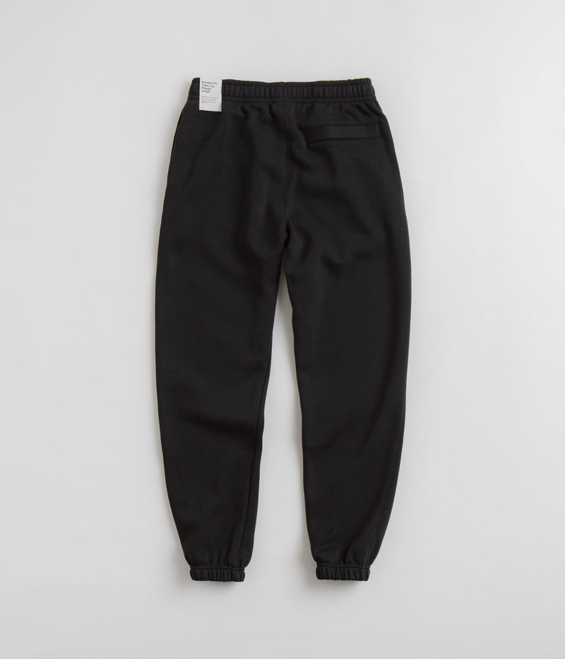 Nike Club Fleece Sweatpants in Black and Black / White