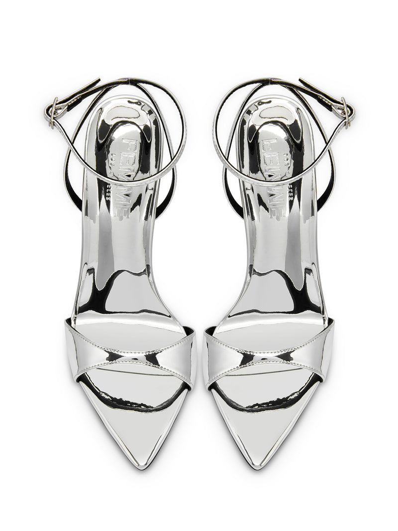 FEMME LA mirror silver GG Heel sandals, overhead flat lay showing FEMME embossed insoles, ankle strap buckles, and pointed toes