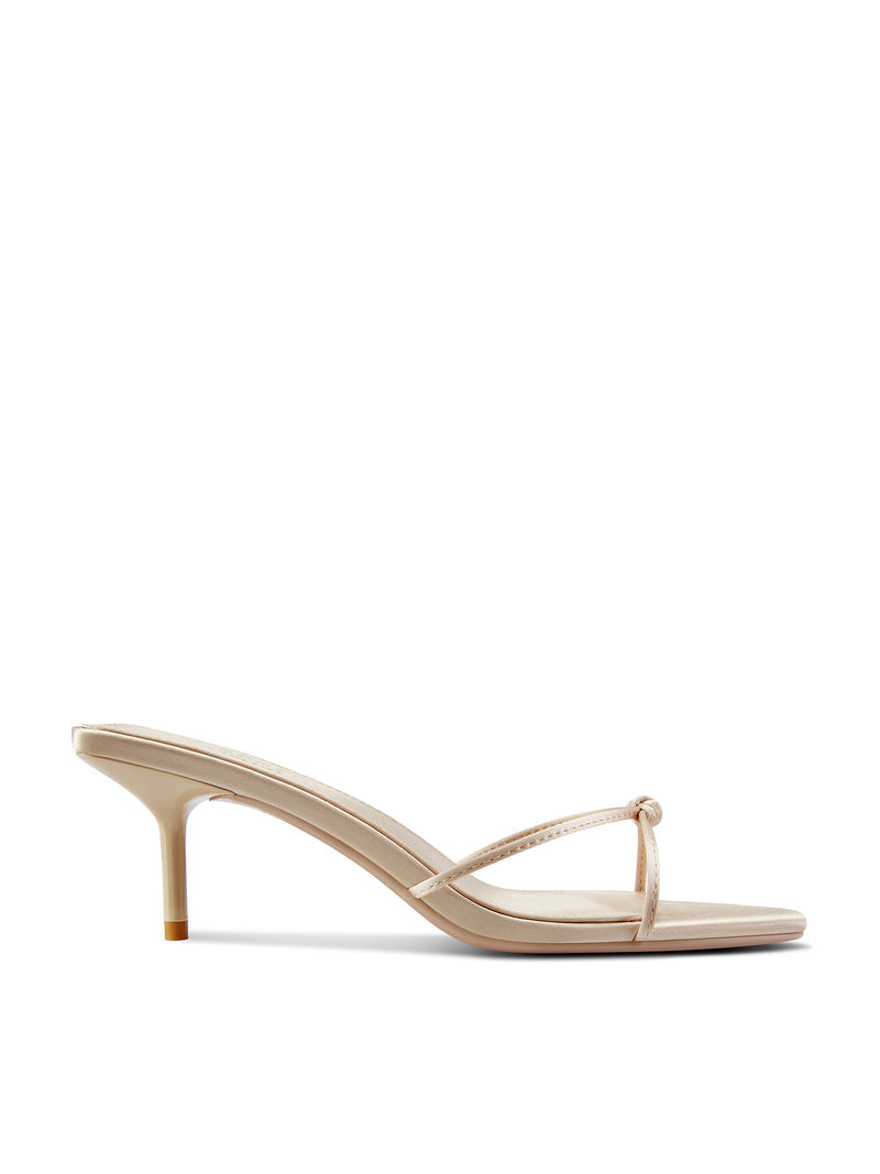 Champagne satin Maeve Slipper by FEMME LA, side view showing low kitten heel and single knot strap across open toe