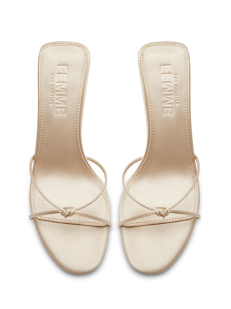 FEMME LA champagne satin Maeve Slipper mules, overhead flat lay showing FEMME LOS ANGELES embossed insoles and knot strap detail