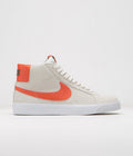 Nike SB Blazer Mid Shoes in Phantom and Cosmic Clay and White - Fir