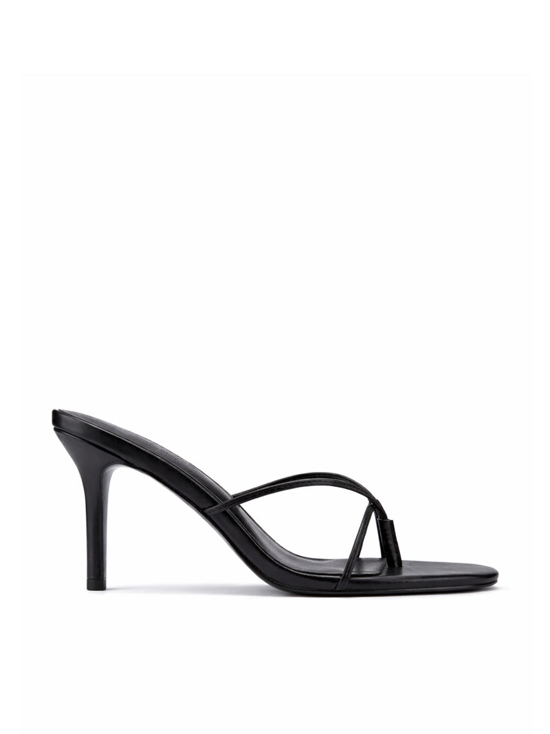 Black smooth leather Sicilian Slipper mule by FEMME LA, side view showing thin crossed straps and mid stiletto heel
