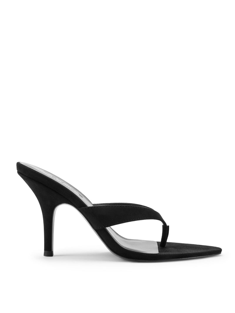 FEMME LA Tokyo Thong Sandal in Noir — side profile showing black suede thong strap, pointed open toe, and slim curved stiletto heel
