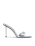 Femme LA Whiskey 100 in Platinum – side profile, silver metallic mule with single thin toe strap, pointed toe, slim silver stiletto