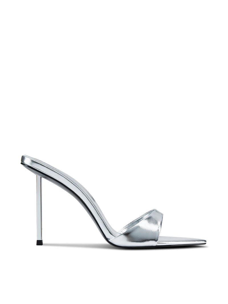 Femme LA Whiskey 100 in Platinum – side profile, silver metallic mule with single thin toe strap, pointed toe, slim silver stiletto