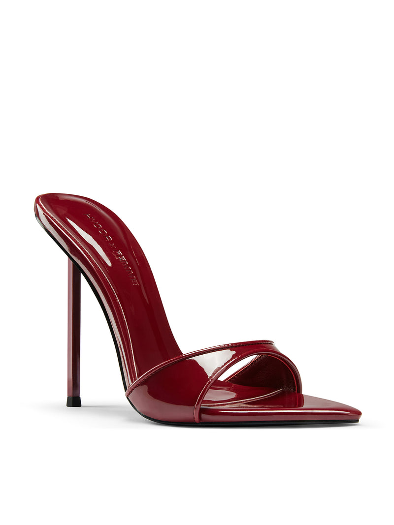 FEMME LA Whiskey Slipper burgundy patent mule — front three-quarter view showing wide toe strap and FEMME LOS ANGELES embossed back