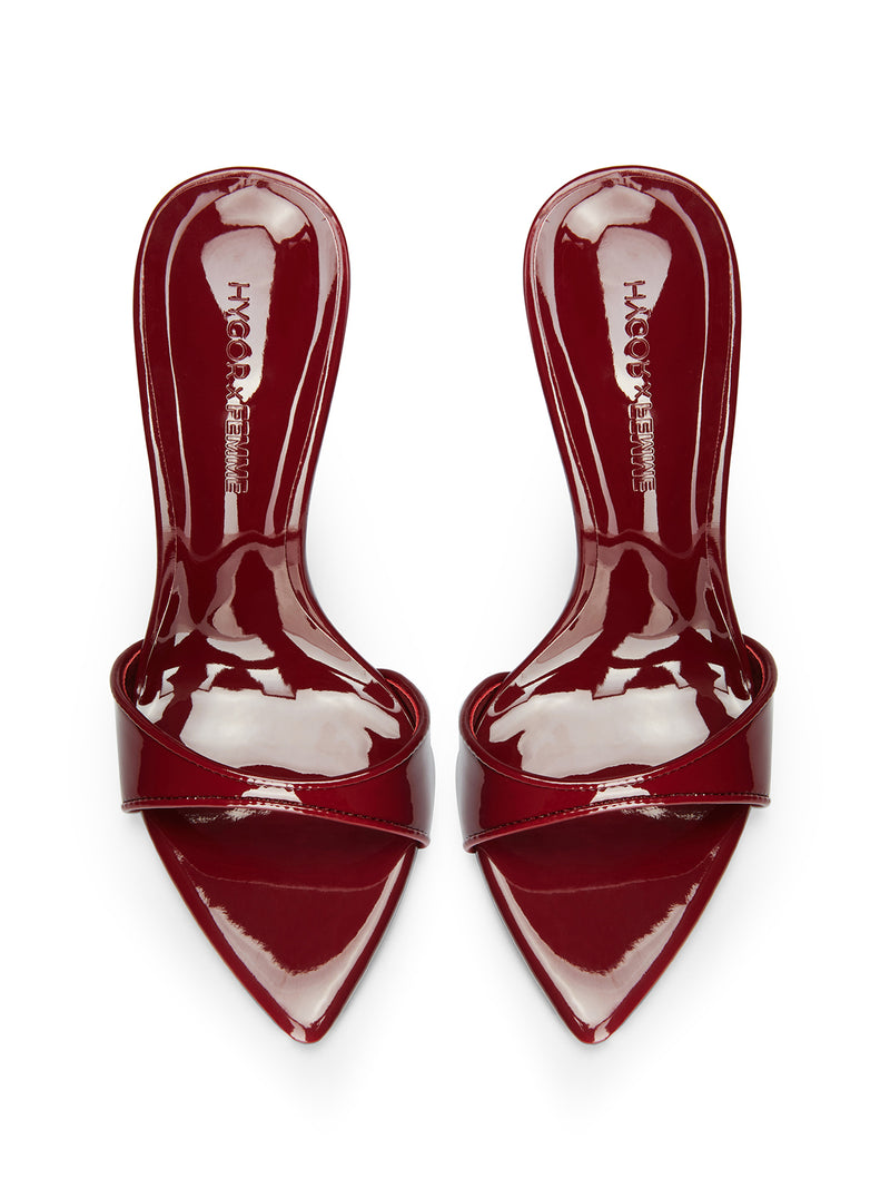 FEMME LA Whiskey Slipper burgundy patent mules — overhead view of the pair showing wide toe strap, pointed toe, and HYGOU x FEMME embossed insole